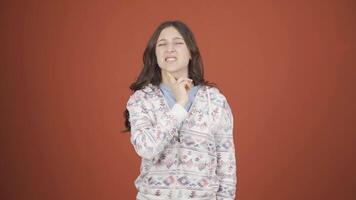 Young woman with sore throat. video