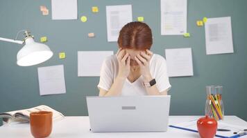 Woman closing laptop with angry expression. video