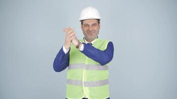 Engineer making a sign of confidence at the camera. video