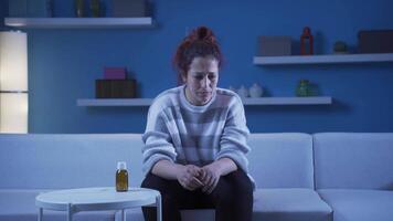 The woman who wants to commit suicide by taking pills. video