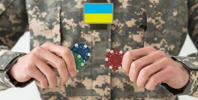 Ukrainian military man with USA flag photo