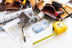 project drawings and tools on table photo