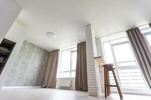 Interior of modern luxury apartment, empty attic, kitchen open space. photo