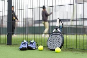 Paddle tennis objects and court. photo