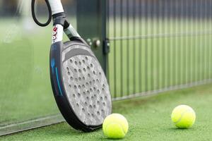 Paddle tennis racket and ball photo