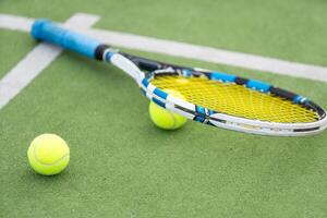 Tennis Court with ball and racket photo