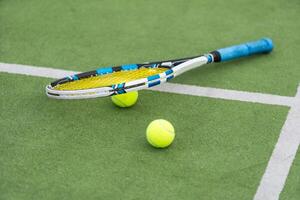 Tennis Court with ball and racket photo