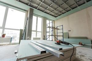 Working process of installing metal frames for plasterboard -drywall photo