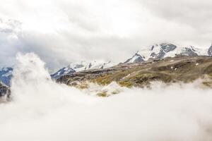 Beautiful exploration tour through the mountains in Switzerland. photo