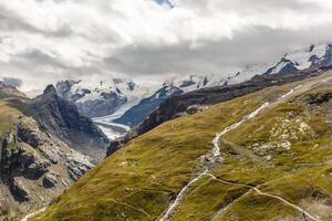 Beautiful exploration tour through the mountains in Switzerland. photo