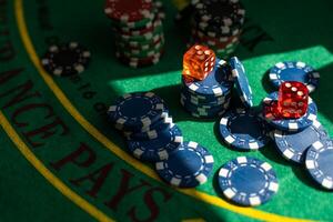 Blur background and chips, Stack of poker chips on a green table. Poker game theme photo