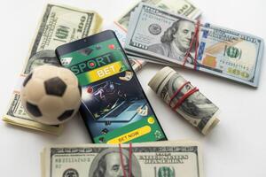 dinero y fútbol pelota - deporte y negocio antecedentes foto