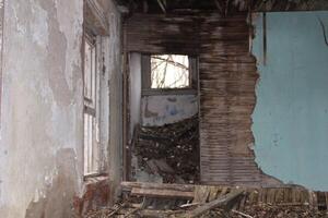 Ruins Of An Abandoned House In The Woods photo