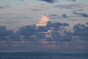 Clouds In THe Sky On A Bright Sunny Day photo