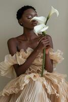 AI generated Afro woman wearing beige chiffon dress and holding lily flower photo