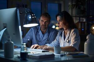 AI generated Doctor and nurse working in front of computer until night photo