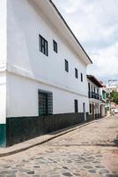 View of the beautiful streets of the Heritage Town of Guaduas located in the Department of Cundinamarca in Colombia. photo