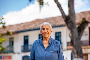 Senior woman tourist at the beautiful heritage town of Salamina in the department of Caldas in Colombia photo