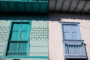 Beautiful facade of the houses at the historical downtown of the heritage town of Salamina located at the Caldas department in Colombia. photo