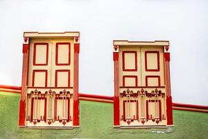 Beautiful facade of the houses at the historical downtown of the heritage town of Salamina located at the Caldas department in Colombia. photo