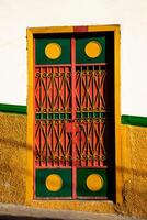 Beautiful facade of the houses at the historical downtown of the heritage town of Salamina located at the Caldas department in Colombia. photo