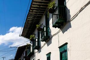 Beautiful facade of the houses at the historical downtown of the heritage town of Salamina located at the Caldas department in Colombia. photo