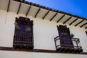 Beautiful facade of the houses at the historical downtown of the heritage town of Salamina located at the Caldas department in Colombia. photo