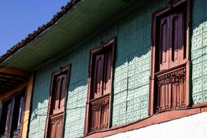 Beautiful facade of the houses at the historical downtown of the heritage town of Salamina located at the Caldas department in Colombia. photo