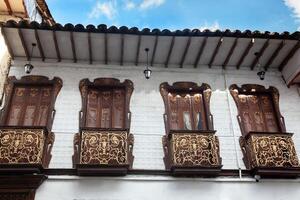 Beautiful facade of the houses at the historical downtown of the heritage town of Salamina located at the Caldas department in Colombia. photo