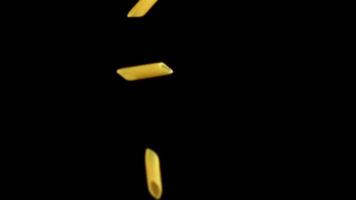 Super slow motion dry pasta falls. Filmed on a high-speed camera at 1000 fps. High quality FullHD footage video