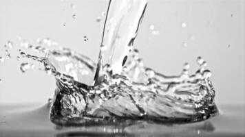 A stunning monochrome showcasing water being poured and splashed into various glassware, capturing the fluidity and beauty of liquid in motion with intense closeup shots video