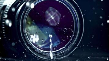 Super slow motion drops of water fall on camera, lens. High quality FullHD footage video