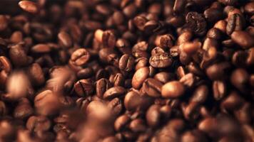 Super slow motion coffee beans are mixed. Macro background.Filmed on a high-speed camera at 1000 fps. High quality FullHD footage video