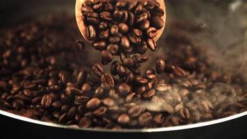 Super slow motion from the wooden scoop falling coffee beans. Macro background.Filmed on a high-speed camera at 1000 fps. video