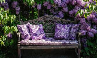 A garden bench adorned with lilac-scented cushions photo