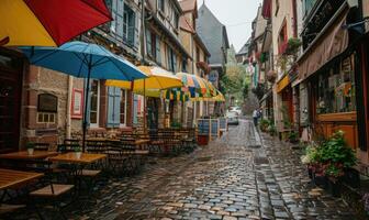 Rain-soaked cobblestone streets winding through a historic European town photo