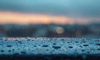 Raindrops cascading off the edge of a rooftop during a heavy downpour photo