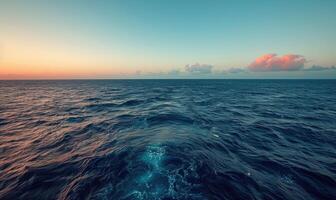 A panoramic view of the ocean at sunset photo