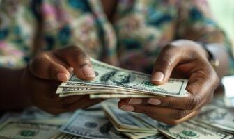 Close-up of a businesswoman's hands counting money photo