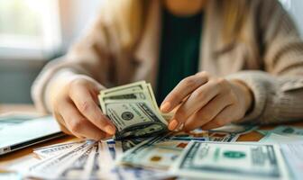 Close-up of a businesswoman's hands counting money photo