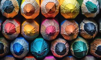 Close-up of a bunch of colored pencils, abstract background with colored pencils macro view photo