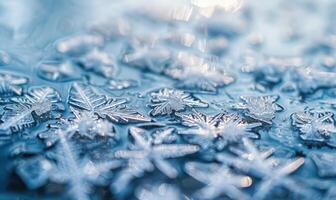 Close-up of icy patterns forming on the surface of a frozen lake photo