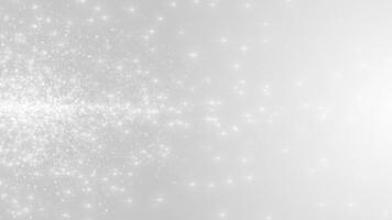 Abstract clean white gray background with flying glowing particles of light and dust. Flight of bright dots. Glitter and sparkles. seamless loop video