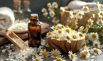 Chamomile essential oil in a dropper bottle, closeup view, skin care cosmetic background photo