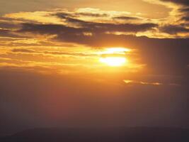 orange at sunset, beautiful with clouds photo