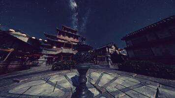 Night View of Japanese Temple Complex Under a Starry Sky video