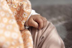 Child's hands in the living room closeup photo