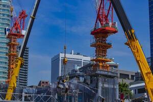 Crane at the under construction in Tokyo long shot photo