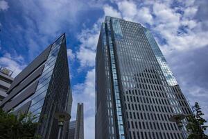 A cloud reflecting the building in the business town wide shot photo