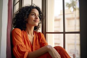 AI generated Happy woman in orange clothes looking at window photo